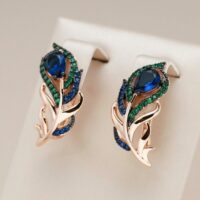 Brinco de Pena Banhado a Ouro Rosê – Pavão Dourado